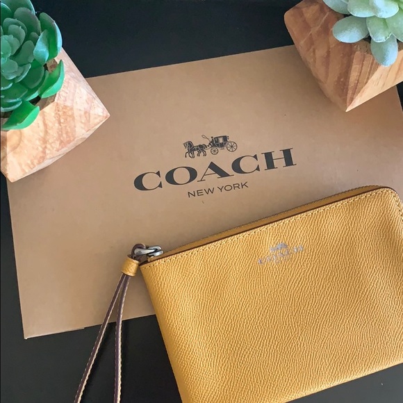 Coach Handbags - Coach Mustard Wristlet
